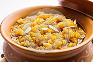 Moong Dal Halwa or Mung Daal Halva is an Indian sweet /ÃÂ dessert recipe, garnished with dry fruits photo